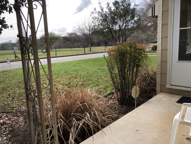 Front porch view of Land Park Golf Course and Comal River - 1034 Elizabeth Ave