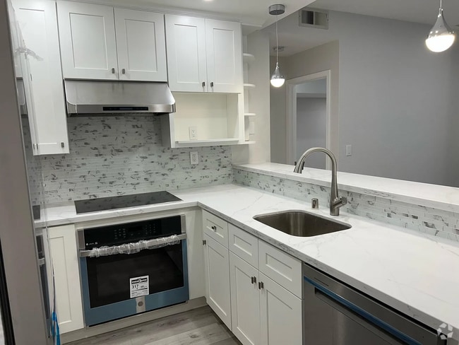 Building Photo - Completely renovated New hardwood floors. Rental