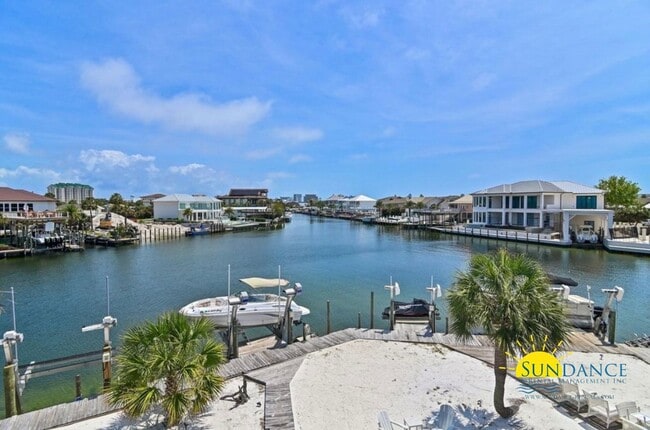 Building Photo - Furnished Long-Term Waterfront Rental with a Boat Lift, Deeded Beach Access, & Prime Destin Locat...