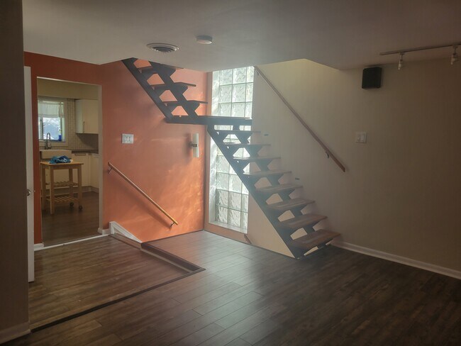 Stairs to 3rd level bedrooms - 1043 S Trenton Ave Unit 2