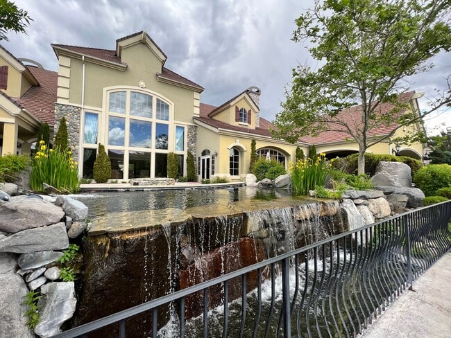 Photo - 9900 Wilbur May Pkwy