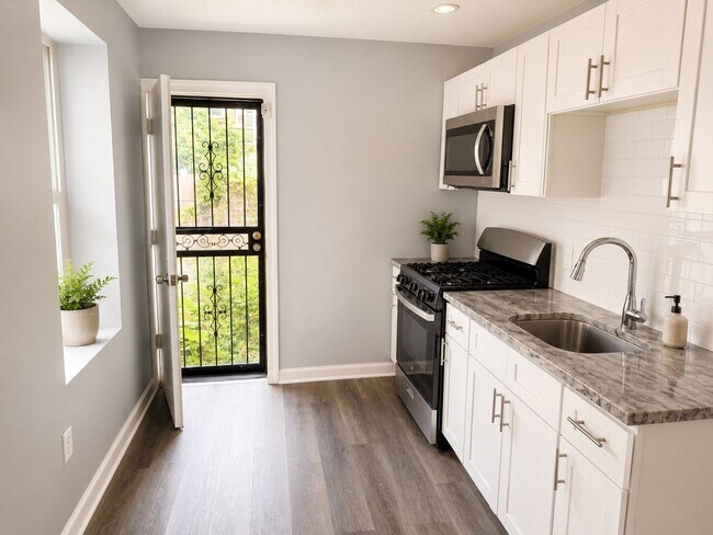 Photo - 3-Bedroom Home with Spacious Backyard and Central Air