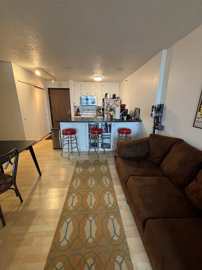 Living room view of kkitchen - 433 S 7th St Unit 1926
