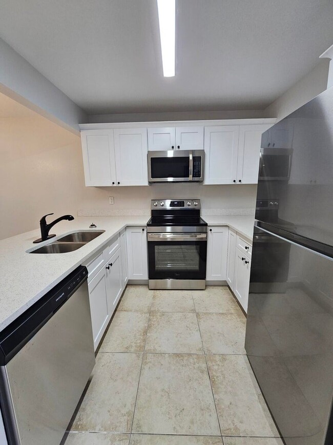 Photo - 1421 Windorah Way Unit E