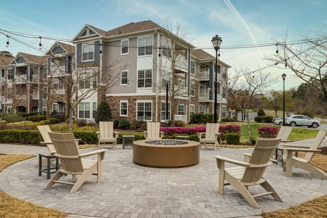 View-At-Legacy-Oaks-Apartment-Homes-in-Knightdale-NC-Outdoor-Fire-Pit-with-Seating - View at Legacy Oaks
