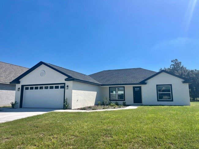 Building Photo - Stunning Brand-New 3BR/2BA Bushnell Block ...
