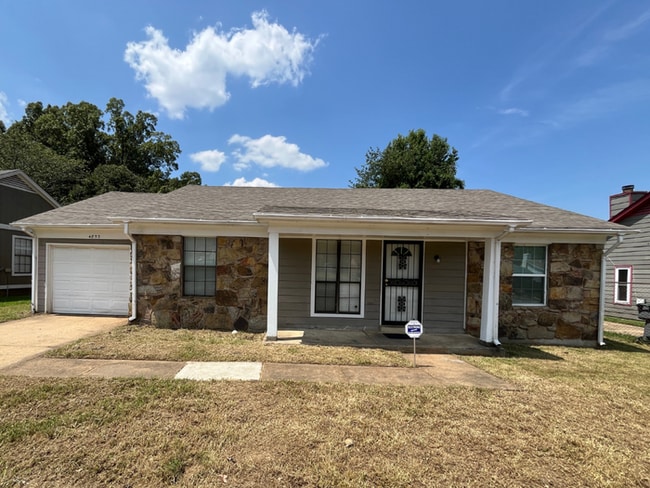 Building Photo - Charming 3BR/2BA Memphis Home | Hardwood Floors, 1-Car Garage & Fenced Yard