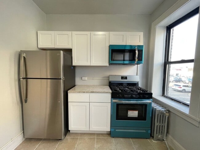 Photo - Hill Manor - Renovated Apartments Near Train Station