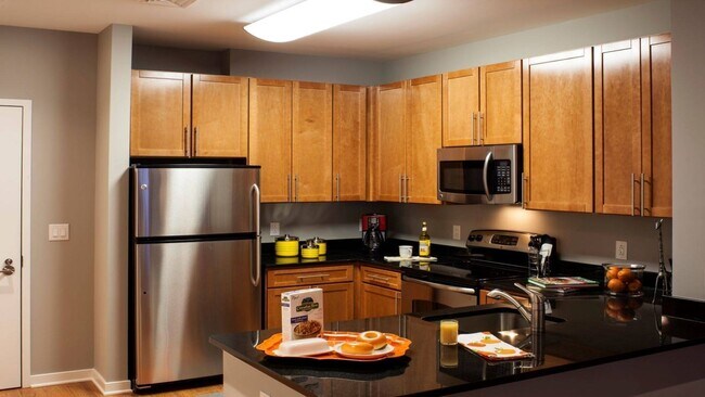 Contemporary Kitchens With Custom Cabinetry - The Madison at Ballston Station Apartments