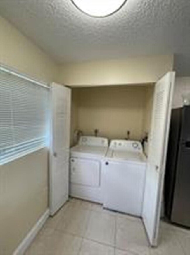 Photo - 9490 Palm Cir S