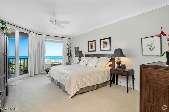Building Photo - 7575 Pelican Bay Blvd Unit 1502 Rental