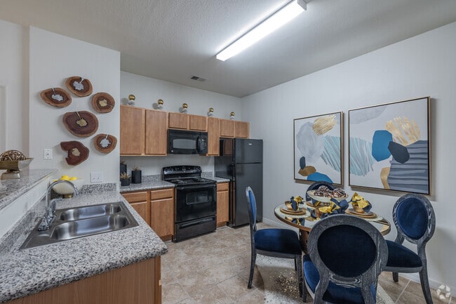 2BR, 2BA Sunroom - 1,035SF - Kitchen and Dining Room