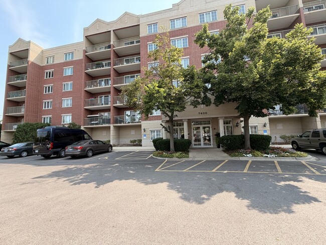 Building Photo - 7400 Lincoln Ave Unit 603