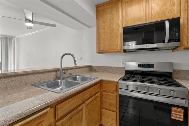 Photo - Bright Upper Level Encino Condo with Balcony, Fireplace, and Resort-Style Pool Unit 232