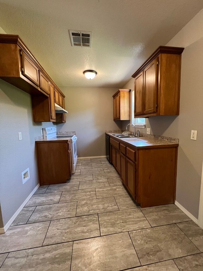 Photo - 3 Bed 1.5 Bath House, 1 Car Carport, Yard Care Included.