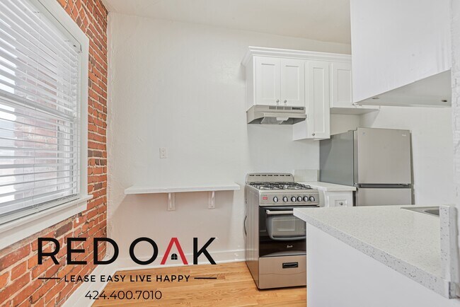 Photo - Stylish Studio with Exposed Red Brick, Sta... Unit 203