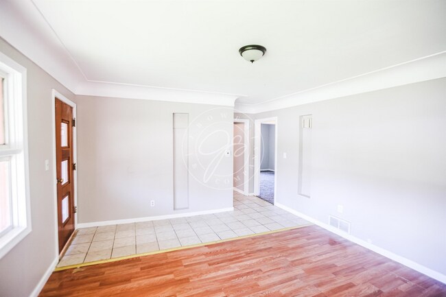 Photo - 3 bed 2 bath with over 1200 sq feet of space! Many updates! Garage included!