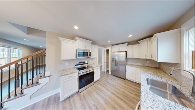 Photo - Beautifully Upgraded Home with Large Eat-In Kitchen And Spacious Primary Suite