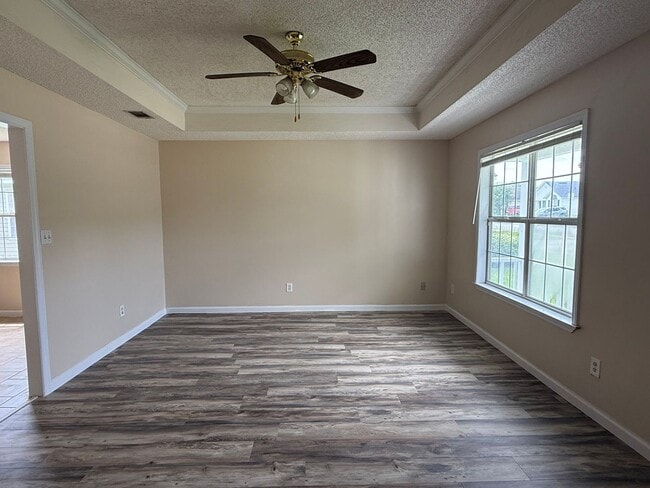Photo - 3BR/2BA Single-Family Home with Versatile Bonus Room & No Carpet!
