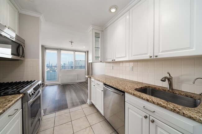 Photo - 6040 JFK Blvd E Unit PH 34C