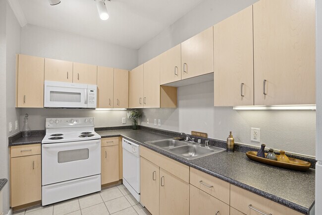 Kitchen with undercabinet lighting and plenty of space for all small appliances