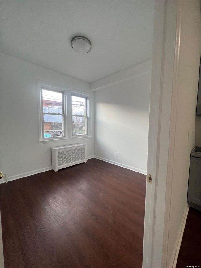 Photo - 41-48-4155 55th St Unit 1Fl