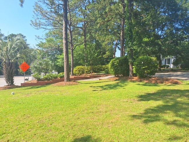 Photo - Magnificent Four Bedroom Home - Minutes Away from Numerous Attractions!