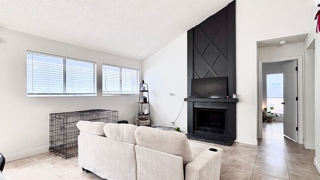 Photo - Fantastic 4 bedroom home with a 1 car garage and driveway space for additional car! Backyard and ...