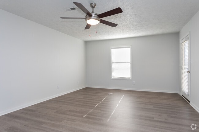 Spacious Living Room with Access to Private Patio/Balcony - Timber Woods