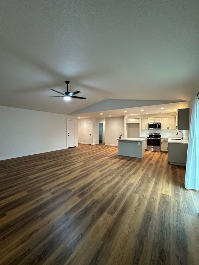 Photo - Updated Home with Island Kitchen, LVP Flooring, and Yard Care Included!