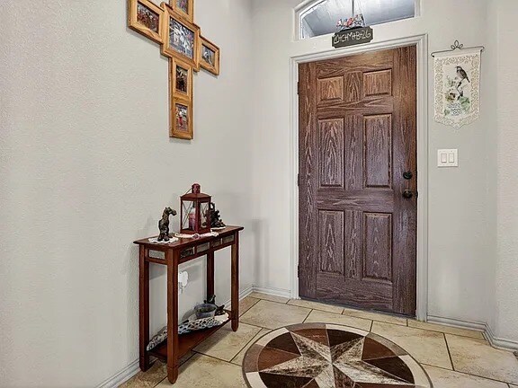 Photo - Comfy 3 Bed/2 Bath Midland Home with all appliances, backyard, attached garage, 6 min to grocery ...