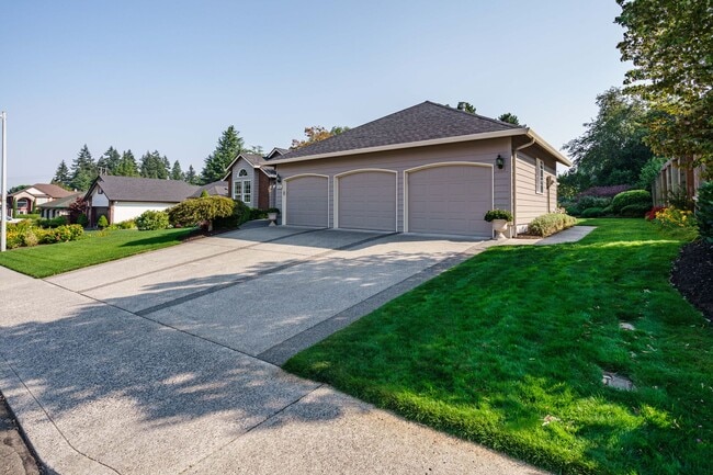 Photo - Beautifully Landscaped 1/4 acre with Well Maintained 4 bedroom 2 Bath Home with 3 Car Garage