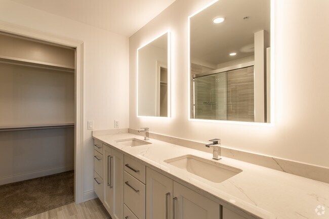Master Bathroom with double vanities and custom built walk in closets - Hubbard Park Place