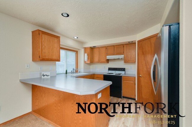 Photo - Comfortable Living with Room to Breathe