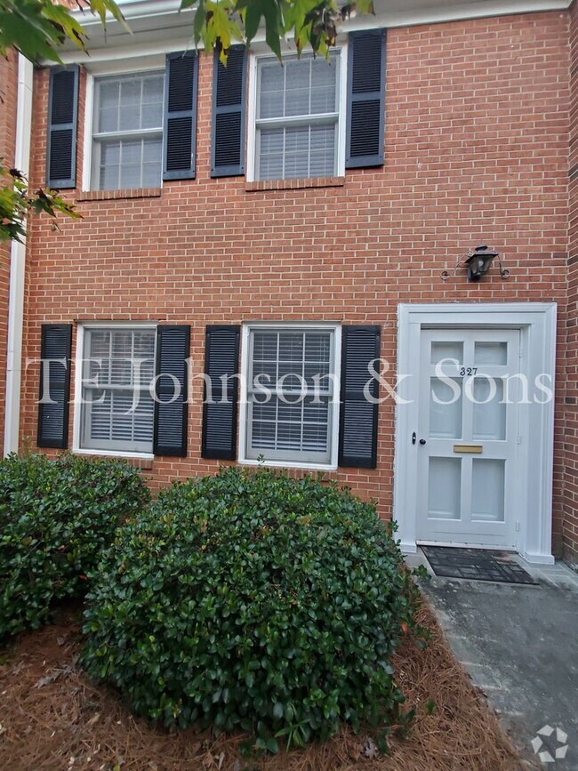 Building Photo - Charming 2-Bedroom Townhome with Ensuite B...