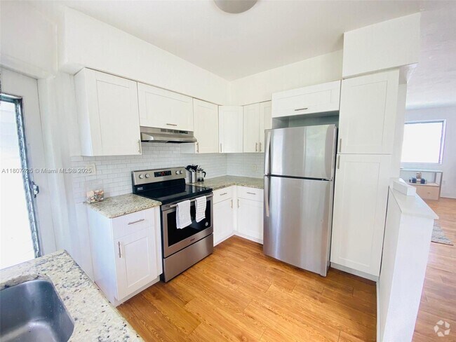 Building Photo - 1135 101st St Unit 4 Rental