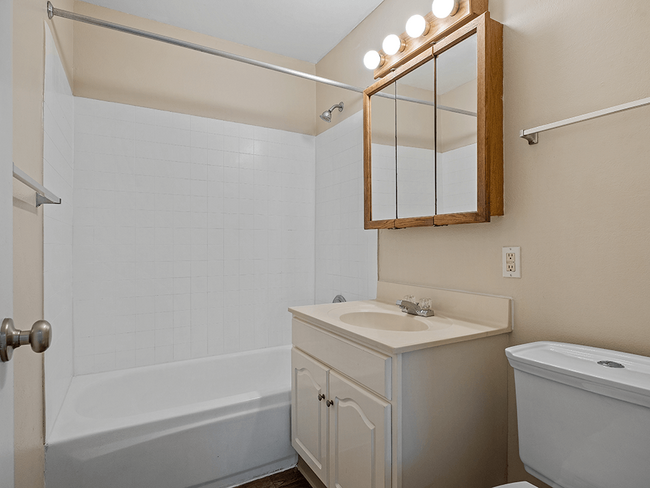 Full Bathroom with Storage Space - Shores of Roosevelt Park Apartments