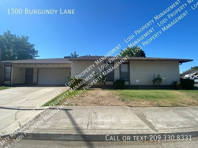 Building Photo - 1300 Burgundy Ln