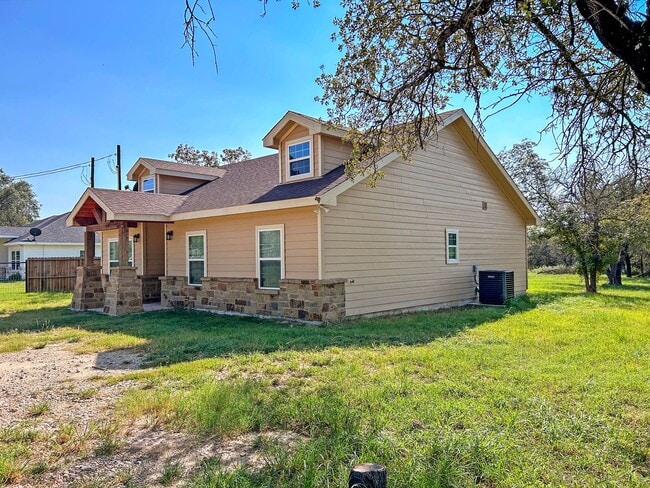 Photo - Elegant Stone-Front Home on 1 Acre in Natalia