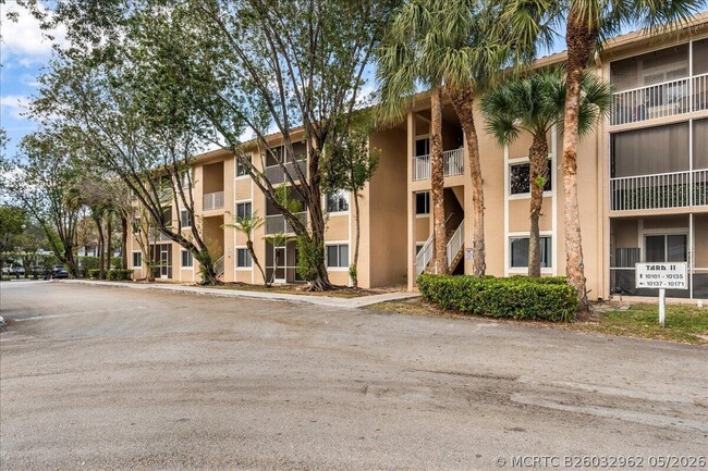 Building Photo - 10129 W Atlantic Blvd Unit E3