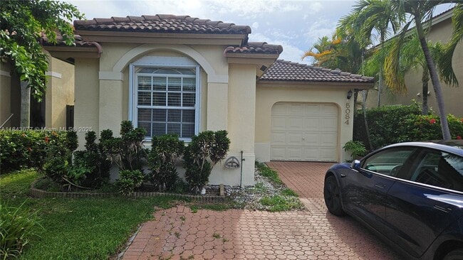 Photo - 5084 NW 112th Ct House