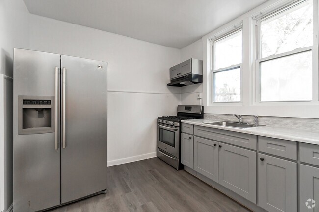 Building Photo - 3 Bed · 1 Bath · 1.122 SQ/FT· Modern Indus... Rental