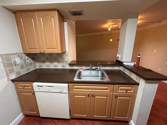 Building Photo - 7165 NW 186th St Unit A204