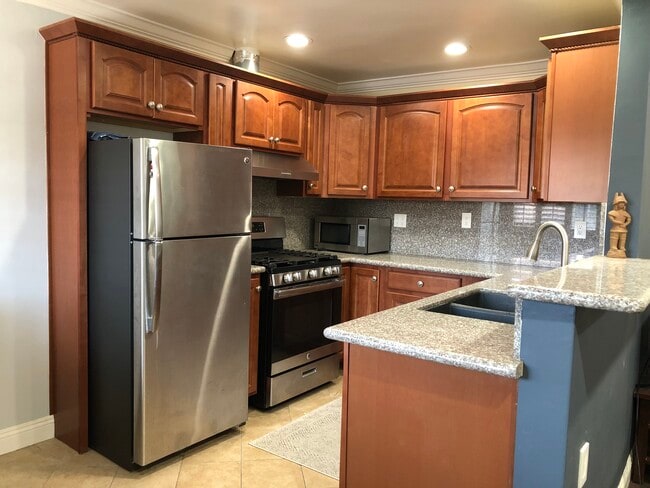 Building Photo - 4633 Marine Ave Unit 258