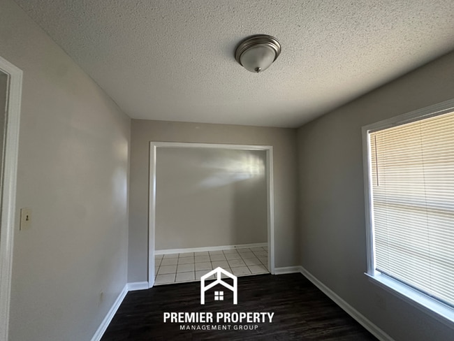 Photo - Gorgeous 4BR/2BA Bartlett Home with Brick Fireplace & Spacious Fenced Yard!
