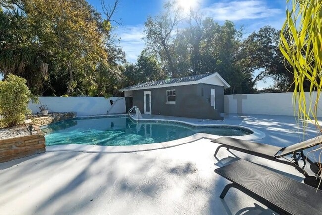 Building Photo - 3909 N Clearfield Ave Unit 2