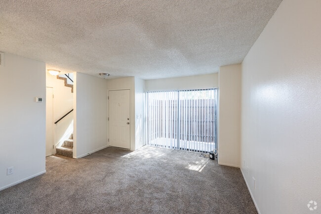 1BR, 1.5BA - 850SF - Living Room - Tamarus Park Apartments