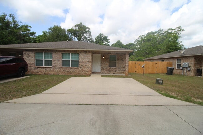 Photo - West Pensacola Duplex Living — 3BR Home with Open Floor Plan, Eat-In Kitchen, Covered Patio & Low... Unit C