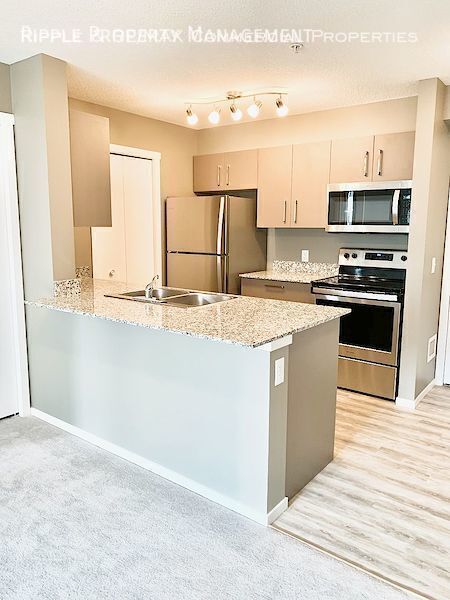 Photo - GORGEOUS 2 BED + DEN/ 2 BATH CONDO IN COMMUNITY OF SKYVIEW Unit 4411