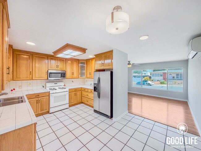 Photo - SD: 2BD/1BA Home in La Mesa with Turf Yards, Large Backyard, W/D & 2-Car Garage